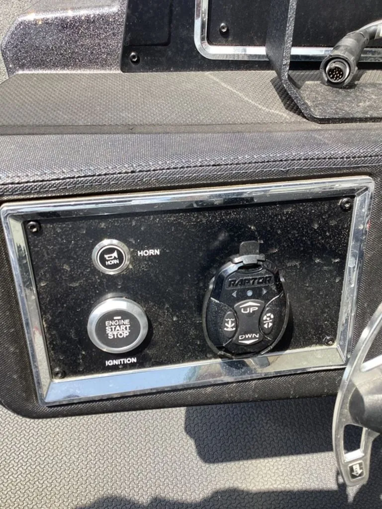 Slide: The Image of Dashboard of 2025 Ranger Z520R with horn and start button. - 32