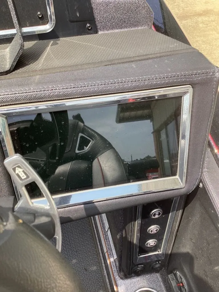Slide: The Image of Interior view of 2025 Ranger Z520R with screen and controls. - 35