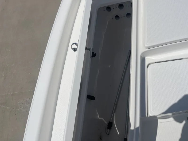Slide: The Image of Interior view of a 2017 Blue Wave 2300 boat storage compartment. - 16