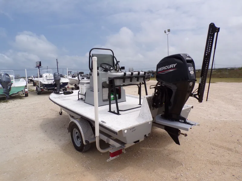 Slide: The Image of 2024 Freedom 14 CHIQUITA boat with Mercury engine on trailer. - 12