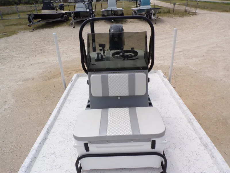 Slide: The Image of 2024 Freedom 14 CHIQUITA boat with steering console and bench seat. - 14