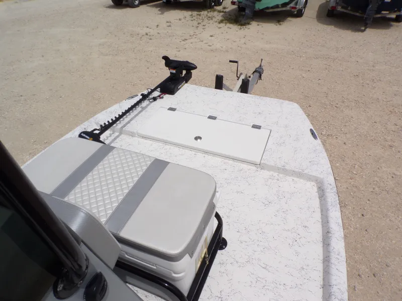 Slide: The Image of 2024 Freedom 14 CHIQUITA boat with gray seat and storage compartment. - 17