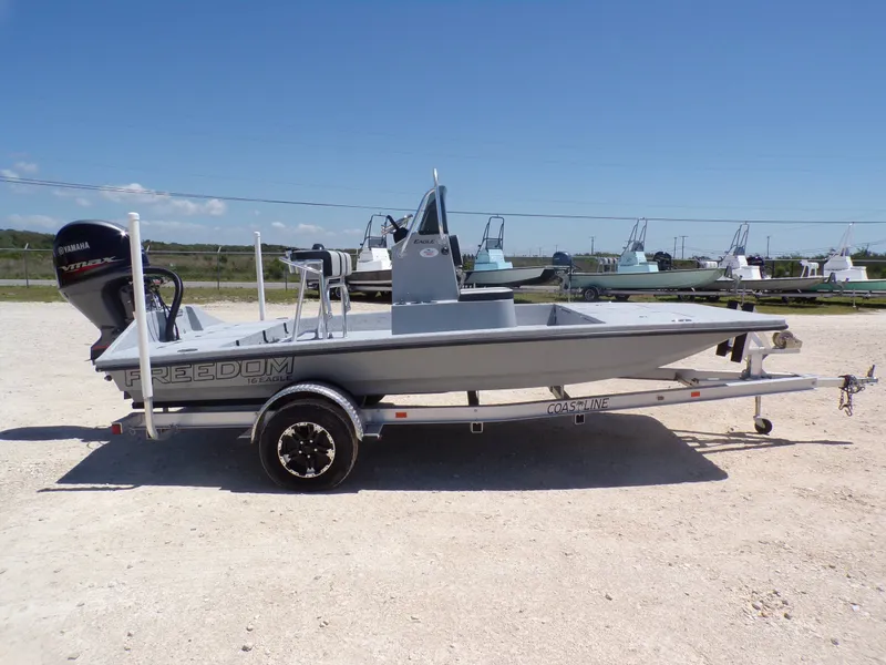 Slide: The Image of Freedom Eagle 16 boat from 2025 on trailer. - 13