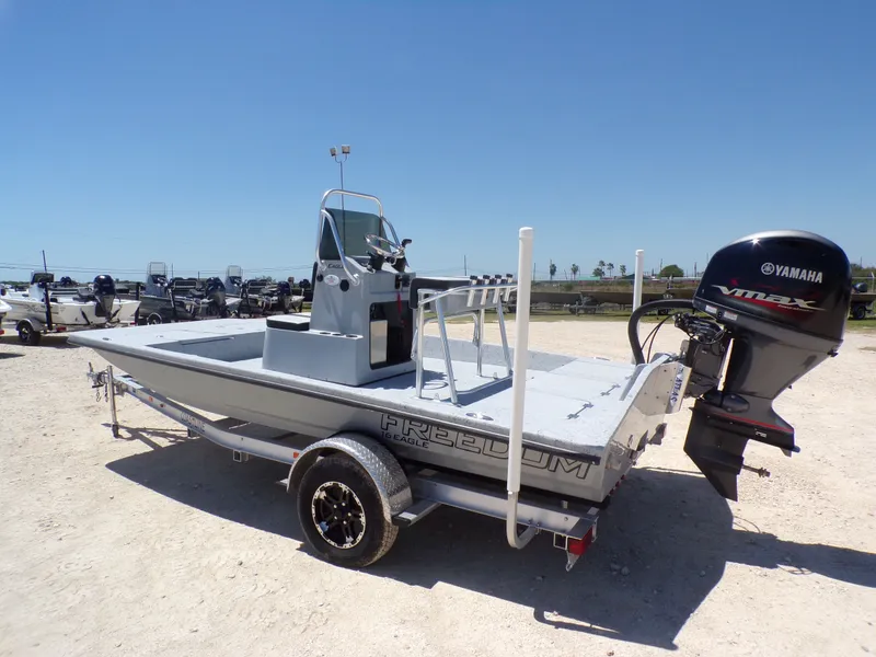 Slide: The Image of Freedom Eagle 16 boat 2025 with Yamaha VMAX engine. - 16