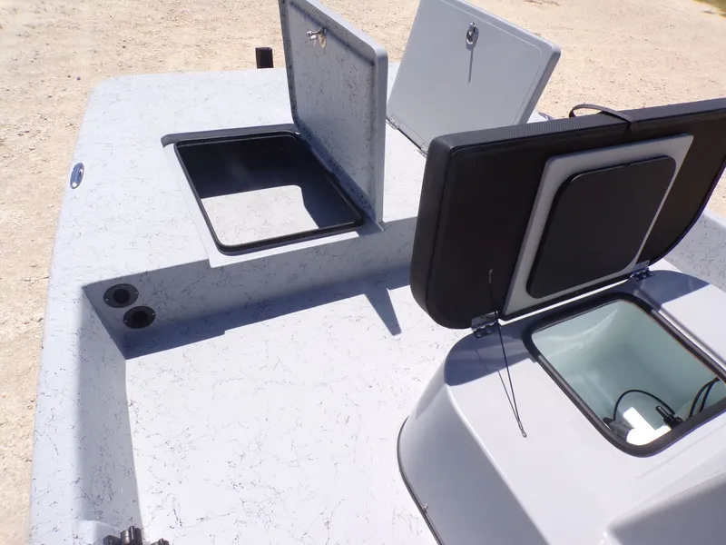 Slide: The Image of Freedom Eagle 16 boat 2025 with open storage compartments. - 20