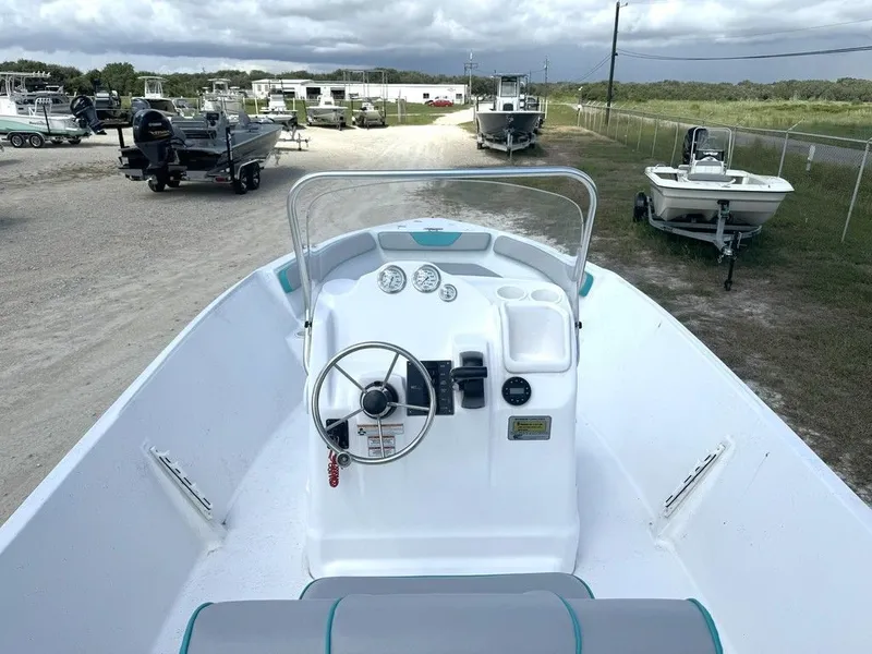 Slide: The Image of 2023 K2 Powerboats 22CRS parked at a boatyard. - 12