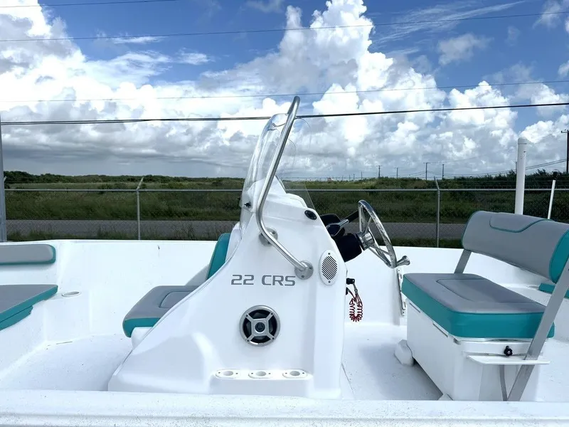 Slide: The Image of 2023 K2 Powerboats 22CRS with blue sky background. - 15