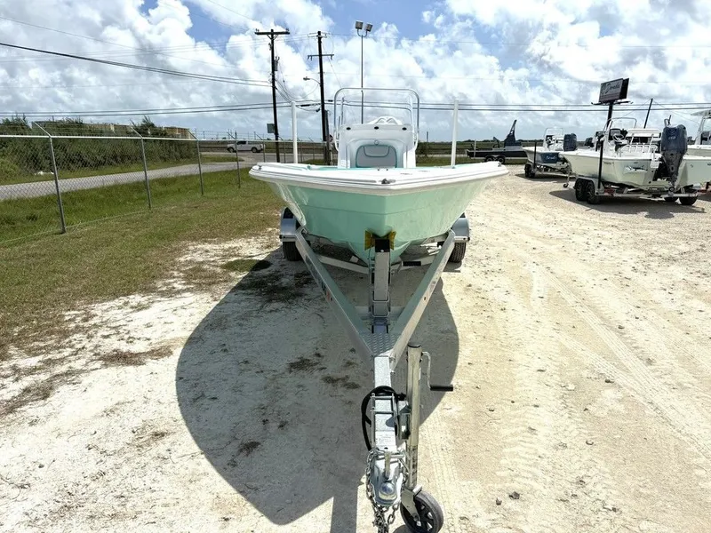 Slide: The Image of 2023 K2 Powerboats 22CRS on trailer under sunny skies. - 5