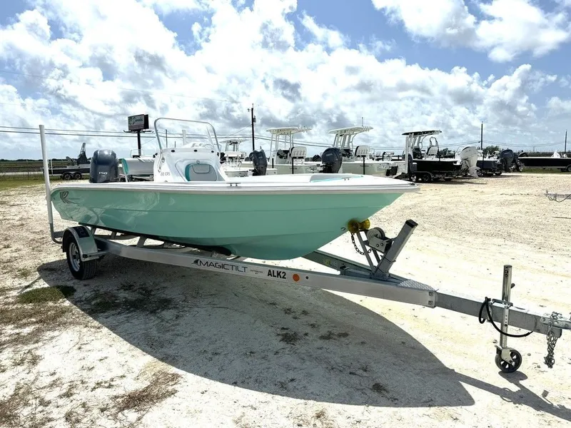 Slide: The Image of 2023 K2 Powerboats 22CRS on trailer under cloudy sky. - 6