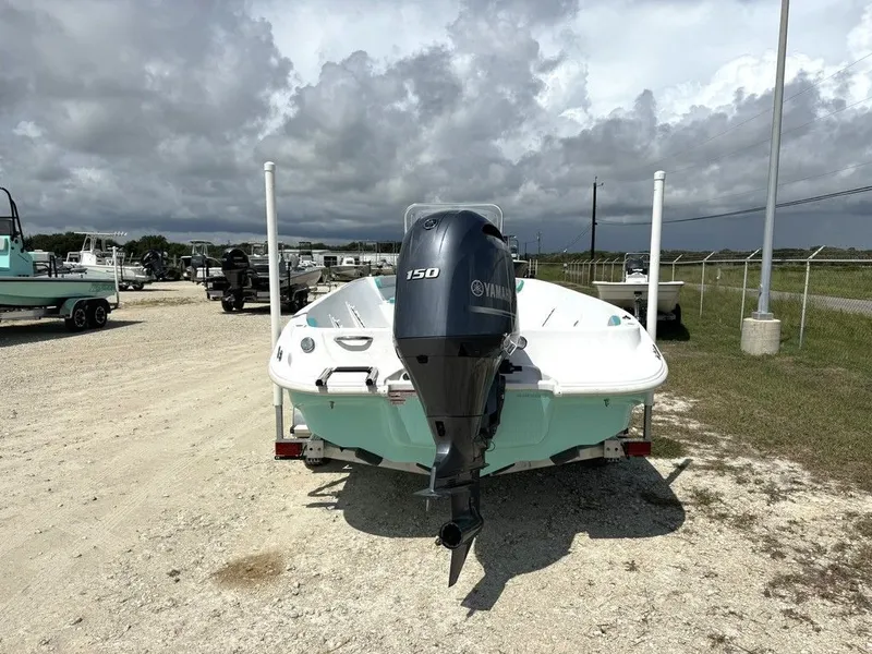 Slide: The Image of 2023 K2 Powerboats 22CRS with Yamaha engine on gravel lot. - 9