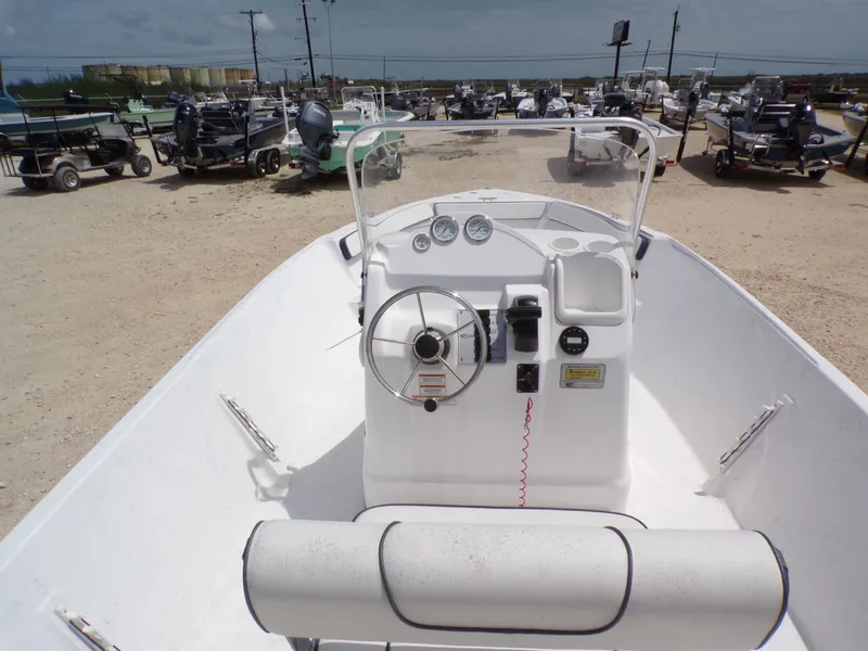 Slide: The Image of 2023 K2 Powerboats 22CRS helm on a boat lot. - 14