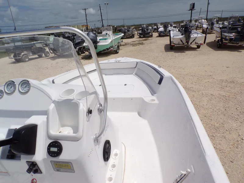 Slide: The Image of 2023 K2 Powerboats 22CRS parked at a boat lot. - 16