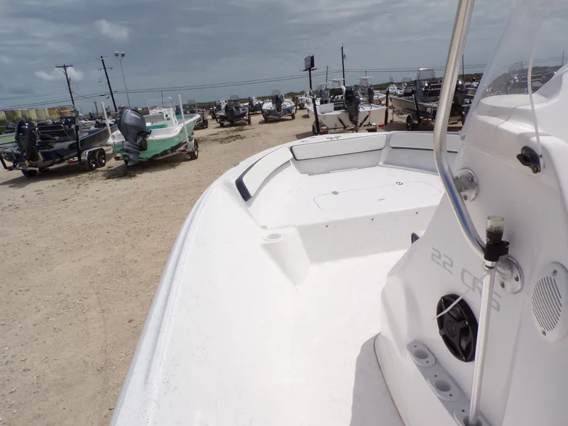 Slide: The Image of 2023 K2 Powerboats 22CRS parked at a boat lot. - 18