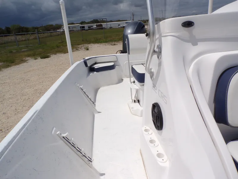 Slide: The Image of 2023 K2 Powerboats 22CRS with white deck and blue accents. - 20