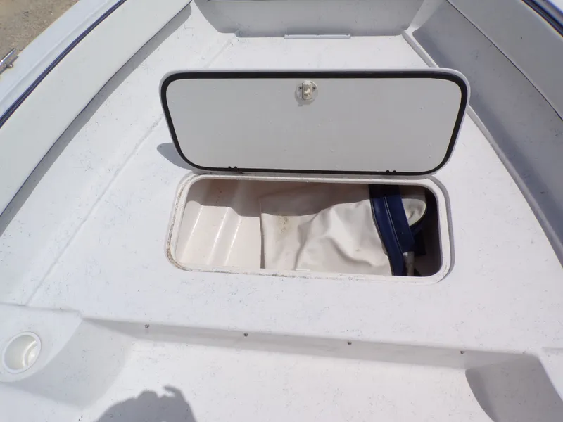 Slide: The Image of K2 Powerboats 22CRS 2023 storage compartment with open hatch. - 21
