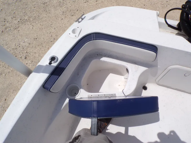 Slide: The Image of Interior view of 2023 K2 Powerboats 22CRS with blue upholstery. - 23