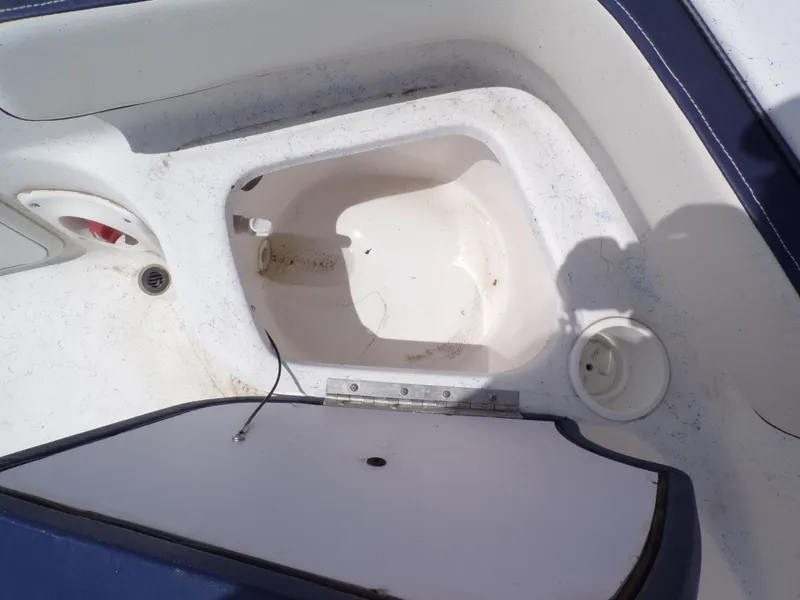 Slide: The Image of Interior of 2023 K2 Powerboats 22CRS with storage compartment. - 24