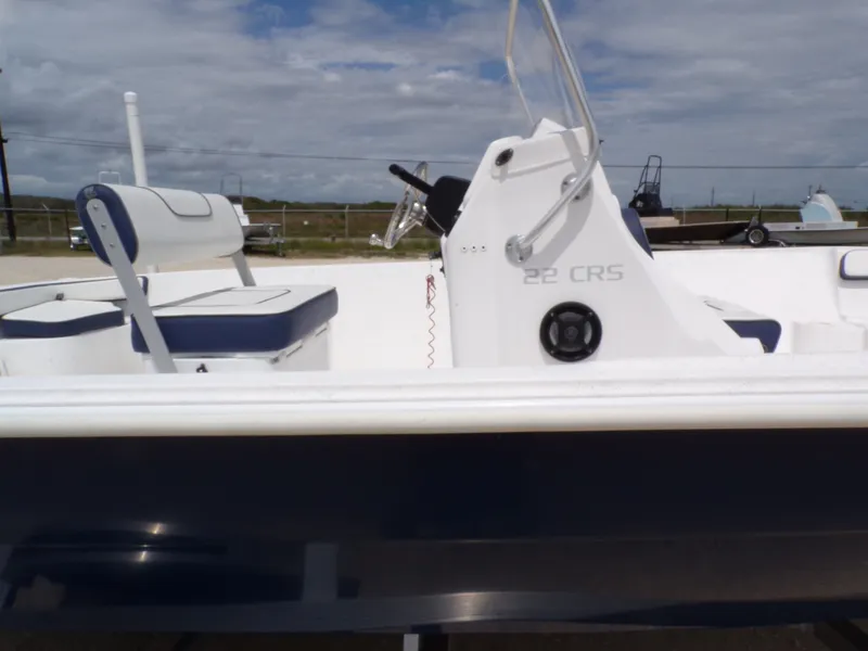 Slide: The Image of 2023 K2 Powerboats 22CRS with blue and white design. - 26