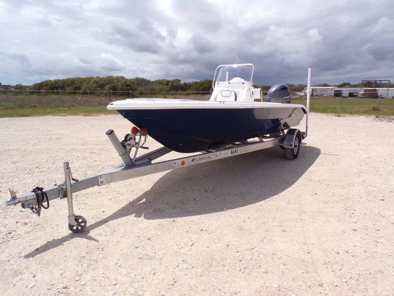 Slide: The Image of 2023 K2 Powerboats 22CRS on trailer, cloudy sky. - 3