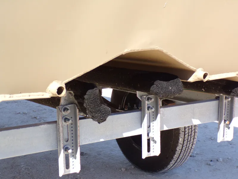 Slide: The Image of Underside of a 2023 SeaArk 1652 MVT boat on trailer. - 10