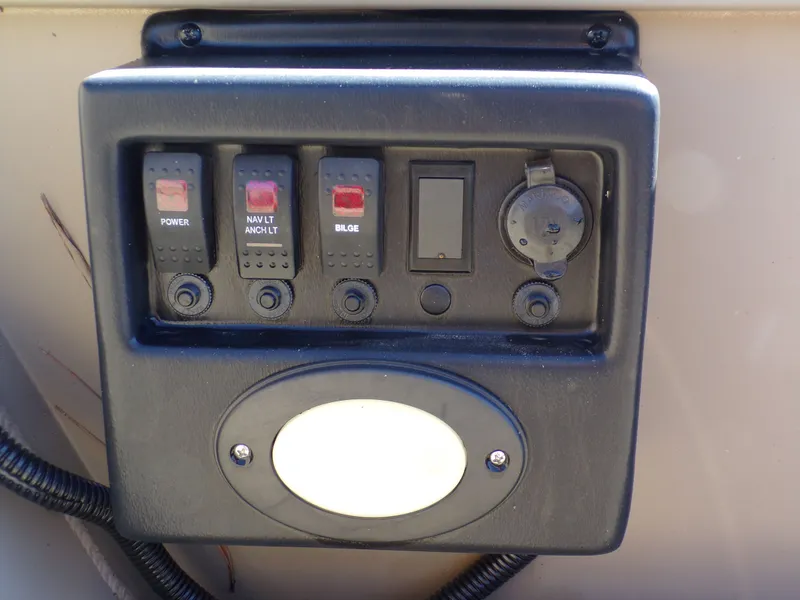 Slide: The Image of Control panel of a 2023 SeaArk 1652 MVT boat. - 15