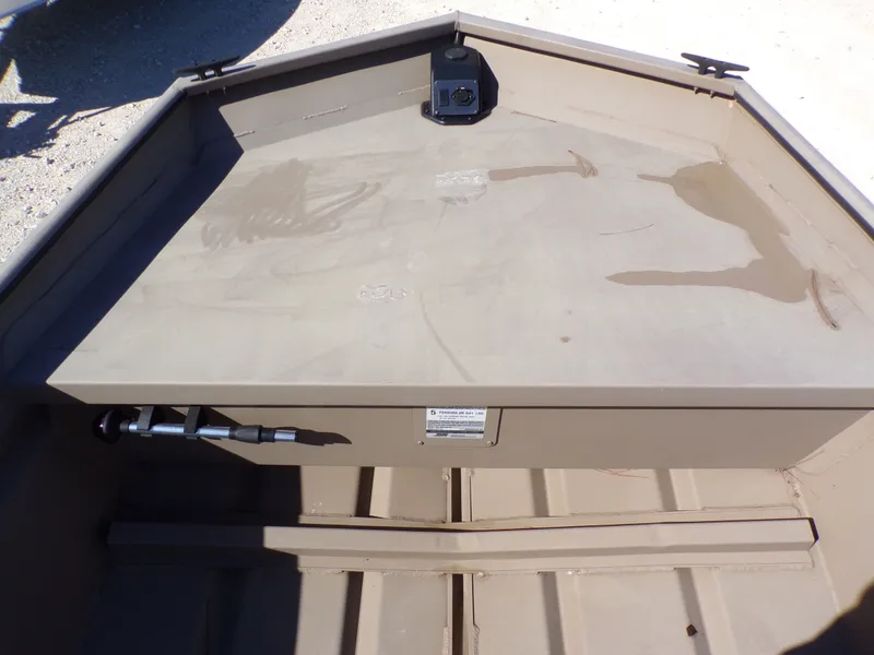 Slide: The Image of Interior view of 2023 SeaArk 1652 MVT boat, beige color. - 21