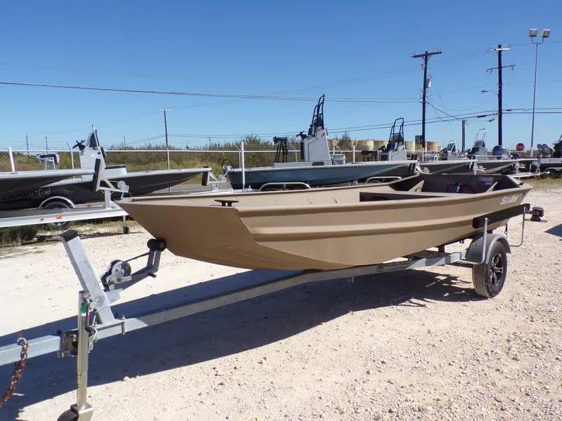 Slide: The Image of 2023 SeaArk 1652 MVT boat on trailer outdoors. - 3