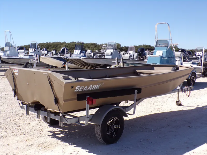 Slide: The Image of 2023 SeaArk 1652 MVT boat on trailer outdoors. - 8