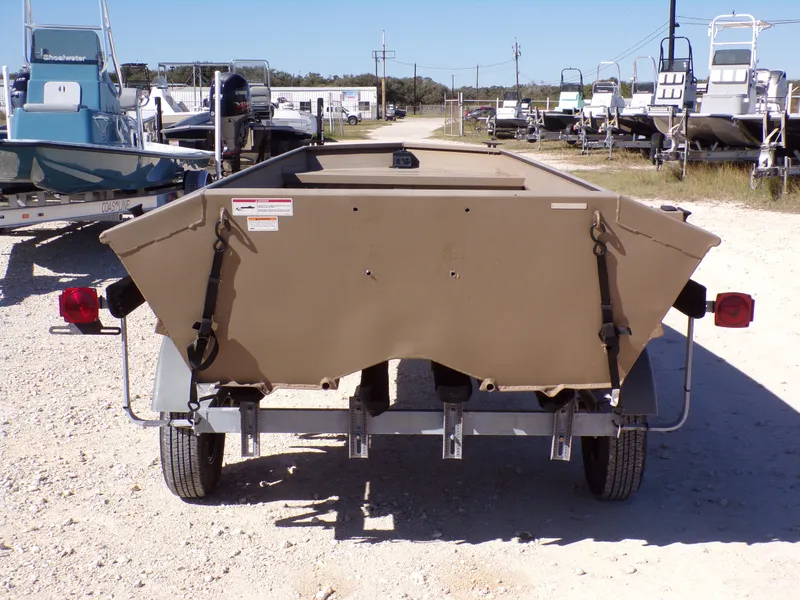 Slide: The Image of Rear view of a 2023 SeaArk 1652 MVT boat on trailer. - 9