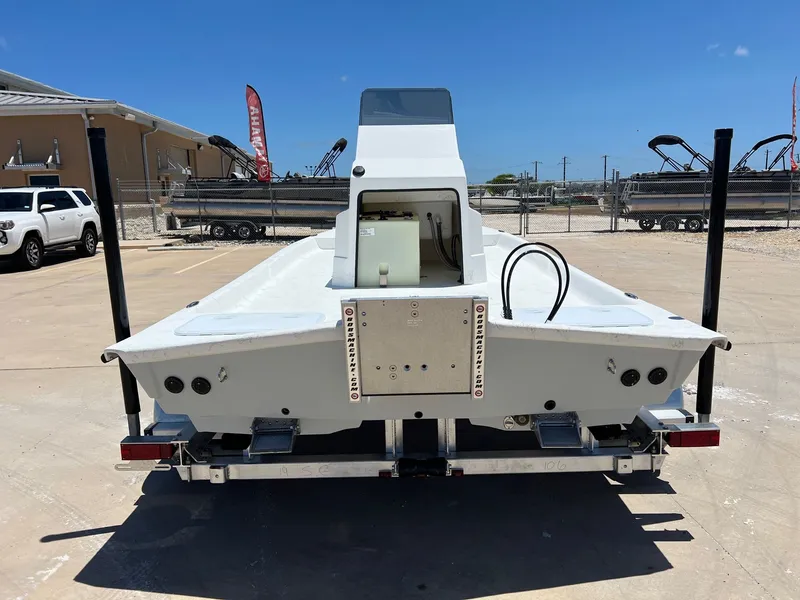 Slide: The Image of Rear view of a 2026 Shoalwater 19' Catamaran on a trailer. - 10