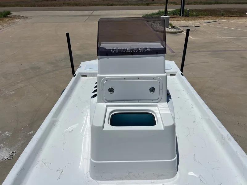 Slide: The Image of 2026 Shoalwater 19' Catamaran on parking lot, front view. - 13