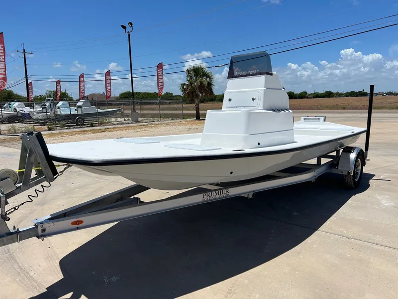 Slide: The Image of 2026 Shoalwater 19' Catamaran on trailer outdoors. - 3