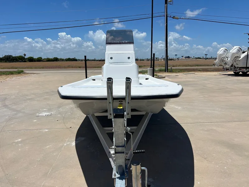 Slide: The Image of 2026 Shoalwater 19' Catamaran on trailer under sunny skies. - 5