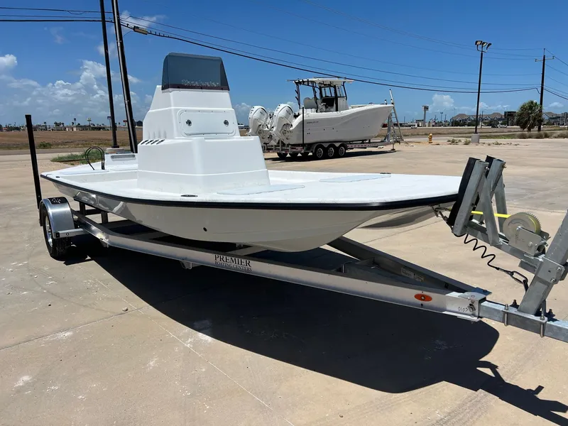Slide: The Image of 2026 Shoalwater 19' Catamaran on trailer outdoors. - 6