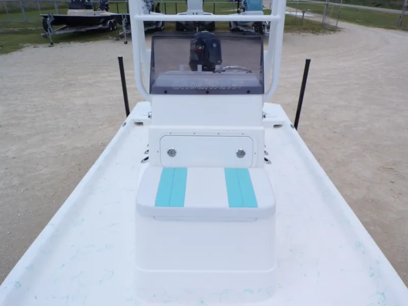 Slide: The Image of 2026 Shoalwater 19' Catamaran with blue seat cushion. - 14