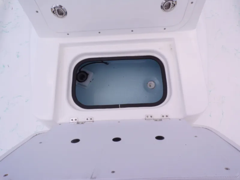 Slide: The Image of Interior view of a Shoalwater 19' Catamaran storage compartment, 2026 model. - 15