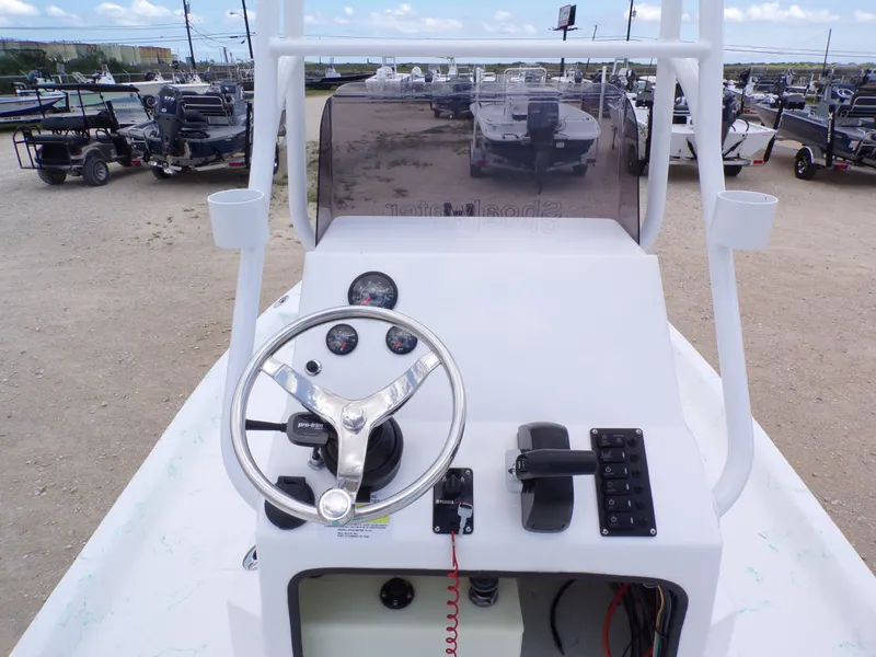 Slide: The Image of Steering console of a 2026 Shoalwater 19' Catamaran. - 19