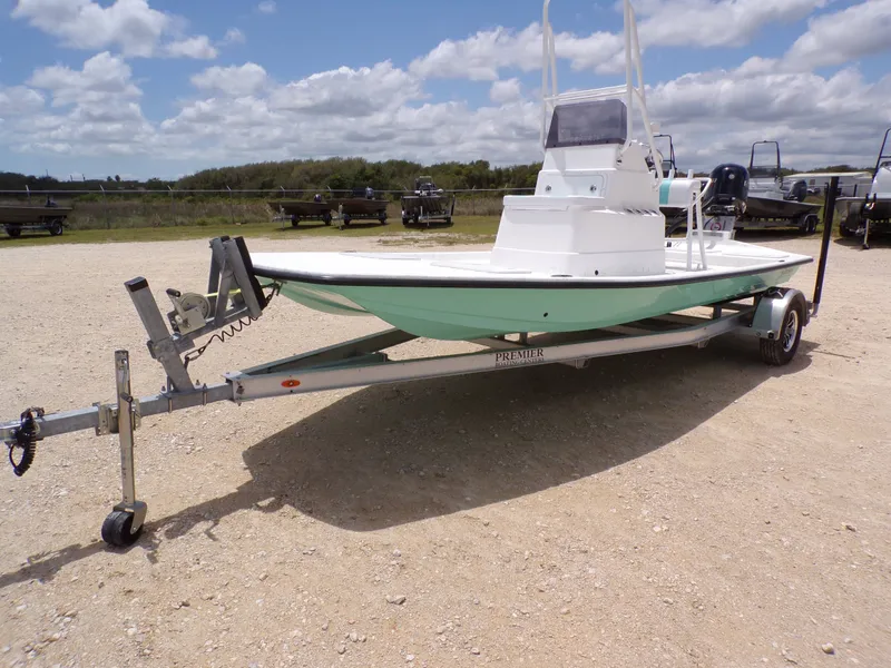 Slide: The Image of 2026 Shoalwater 19' Catamaran on trailer under blue sky. - 3