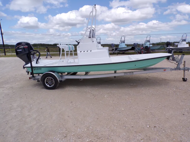 Slide: The Image of 2026 Shoalwater 19' Catamaran on trailer, exterior view. - 8