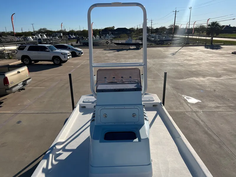 Slide: The Image of 2026 Shoalwater 19' Catamaran on parking lot under sunlight. - 13