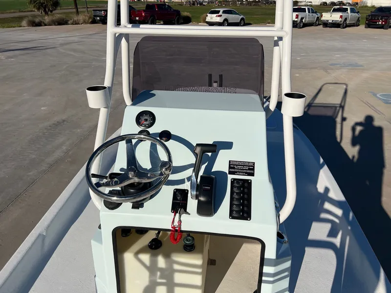 Slide: The Image of Helm of a 2026 Shoalwater 19' Catamaran. - 14