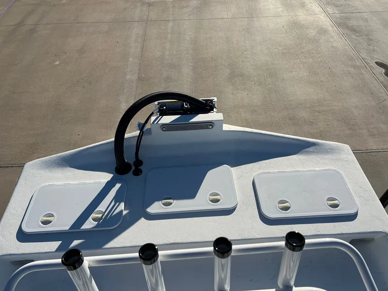 Slide: The Image of 2026 Shoalwater 19' Catamaran deck view with storage compartments. - 16