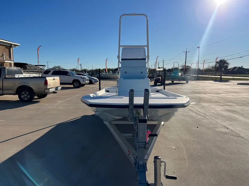 Slide: The Image of 2026 Shoalwater 19' Catamaran on a trailer outdoors. - 5
