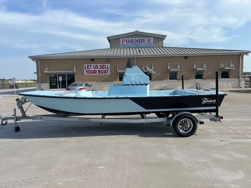 The Image of Shoalwater 20' Catamaran 2026 in front of boat sales center. - 1