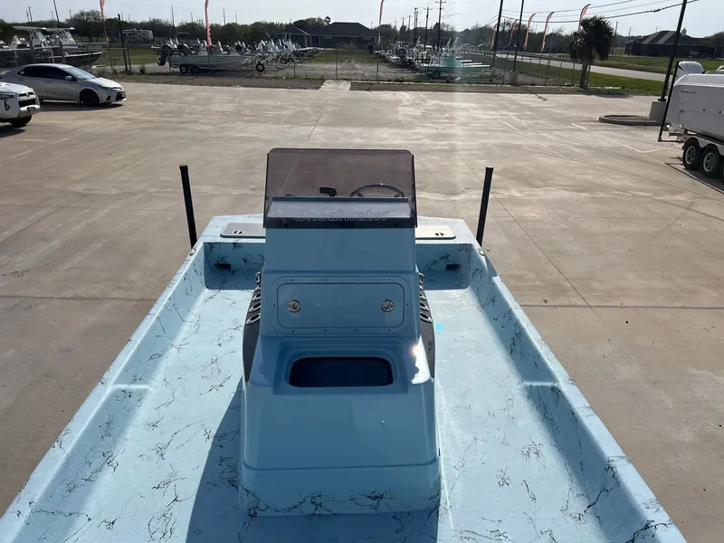 Slide: The Image of 2026 Shoalwater 20' Catamaran on parking lot, front view. - 14