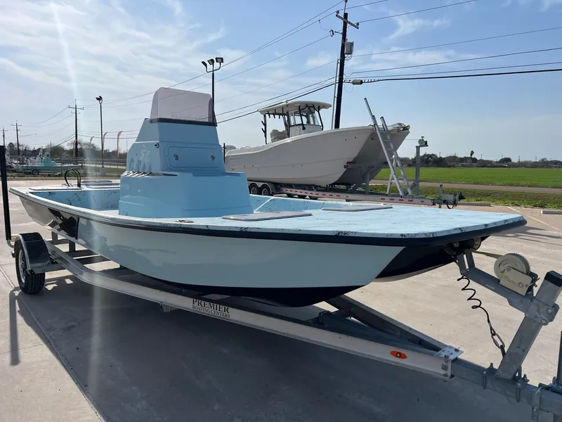 Slide: The Image of 2026 Shoalwater 20' Catamaran on trailer outdoors. - 9