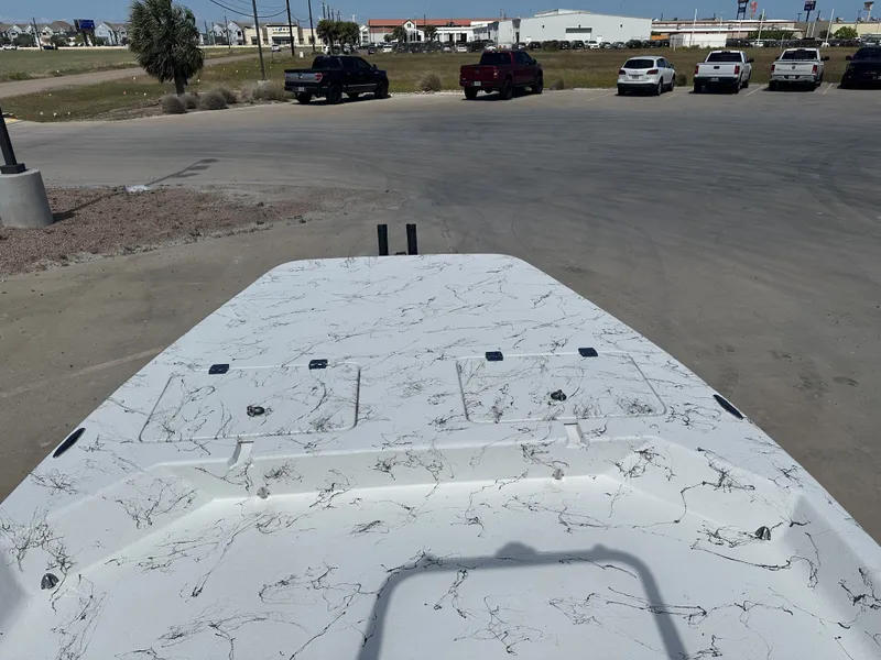 Slide: The Image of 2026 Shoalwater 21' Catamaran on parking lot, front view. - 18