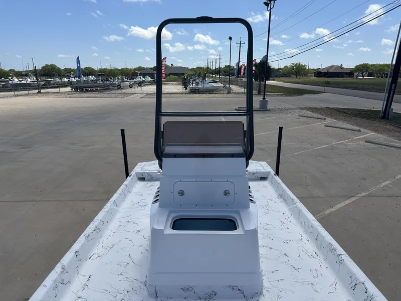 Slide: The Image of 2026 Shoalwater 21' Catamaran on parking lot under sunny skies. - 19