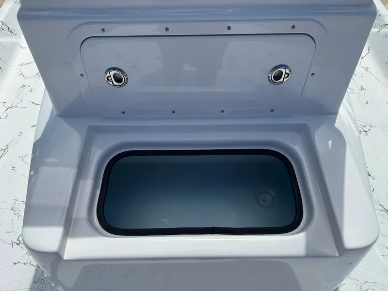 Slide: The Image of Interior view of a Shoalwater 21' Catamaran storage compartment, 2026 model. - 9