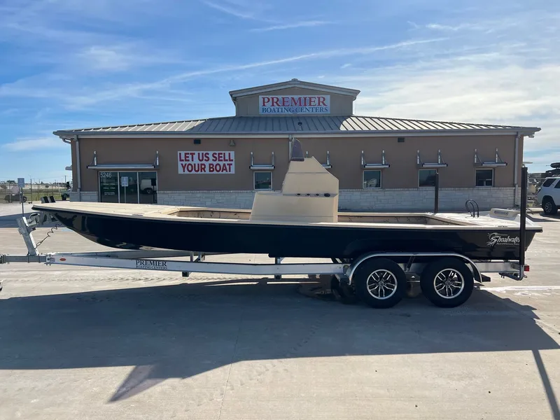 The Image of 2026 Shoalwater 23' Catamaran in front of boat sales center. - 1